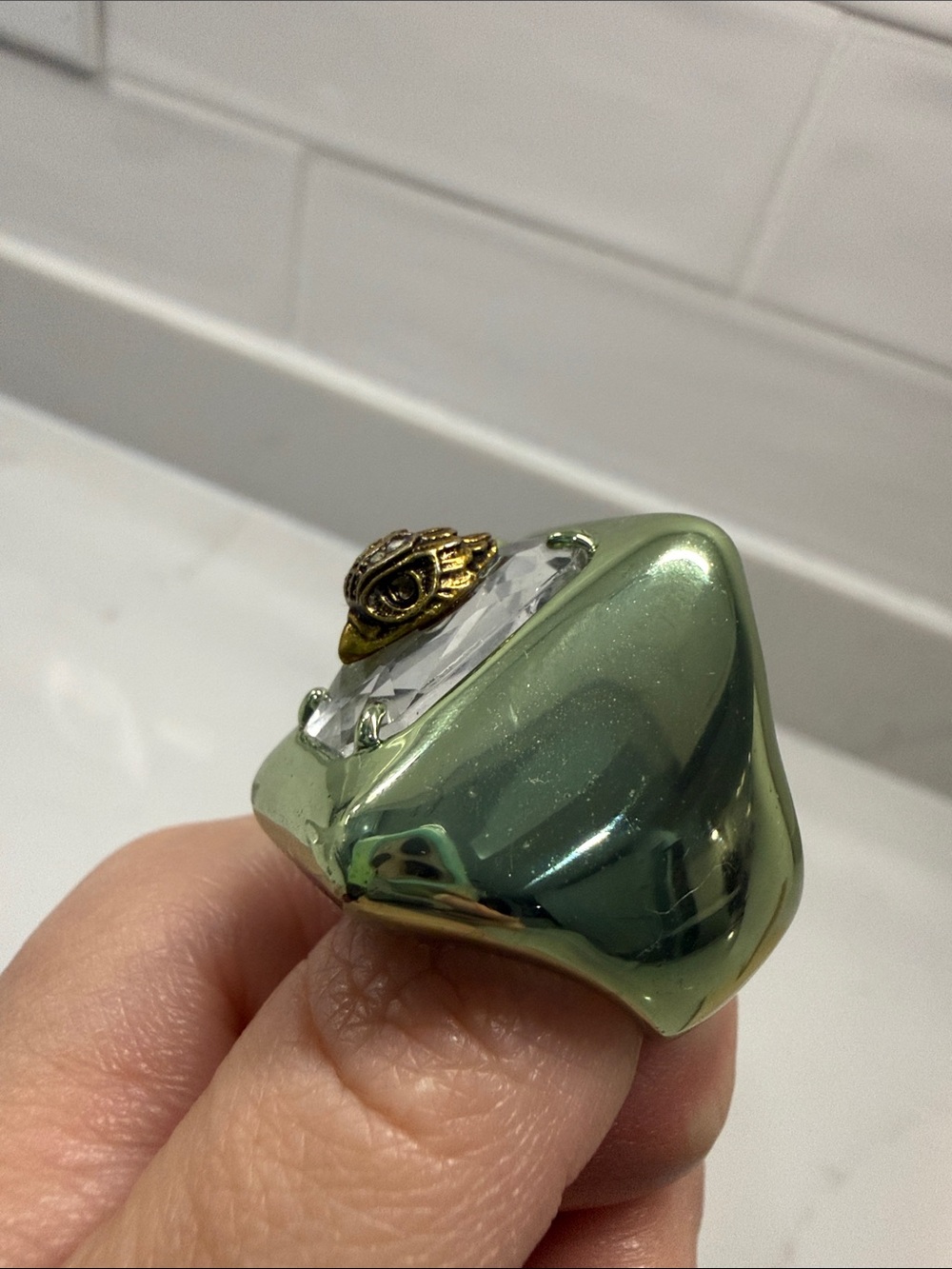 Kurt Geiger Green Metallic Statement Ring with Clear Gem and Gold Accent - Picture 3 of 6